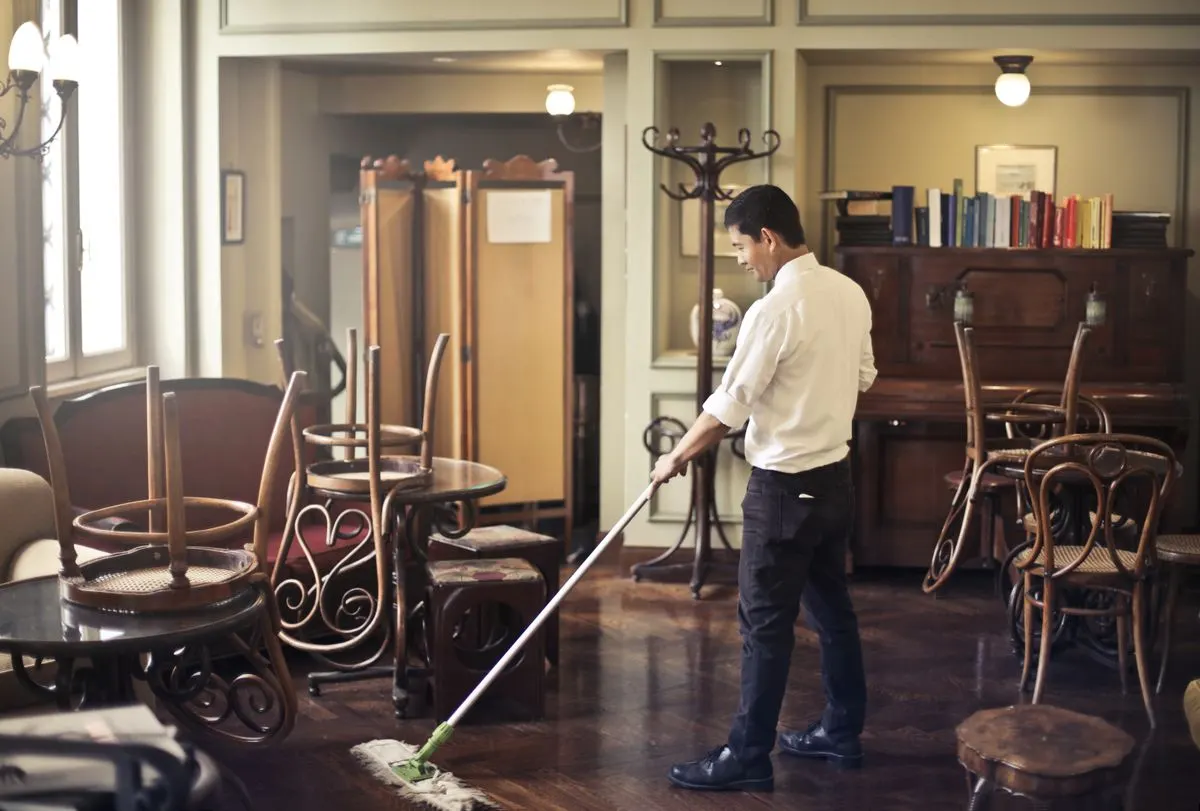 Mopping a restaurant floor